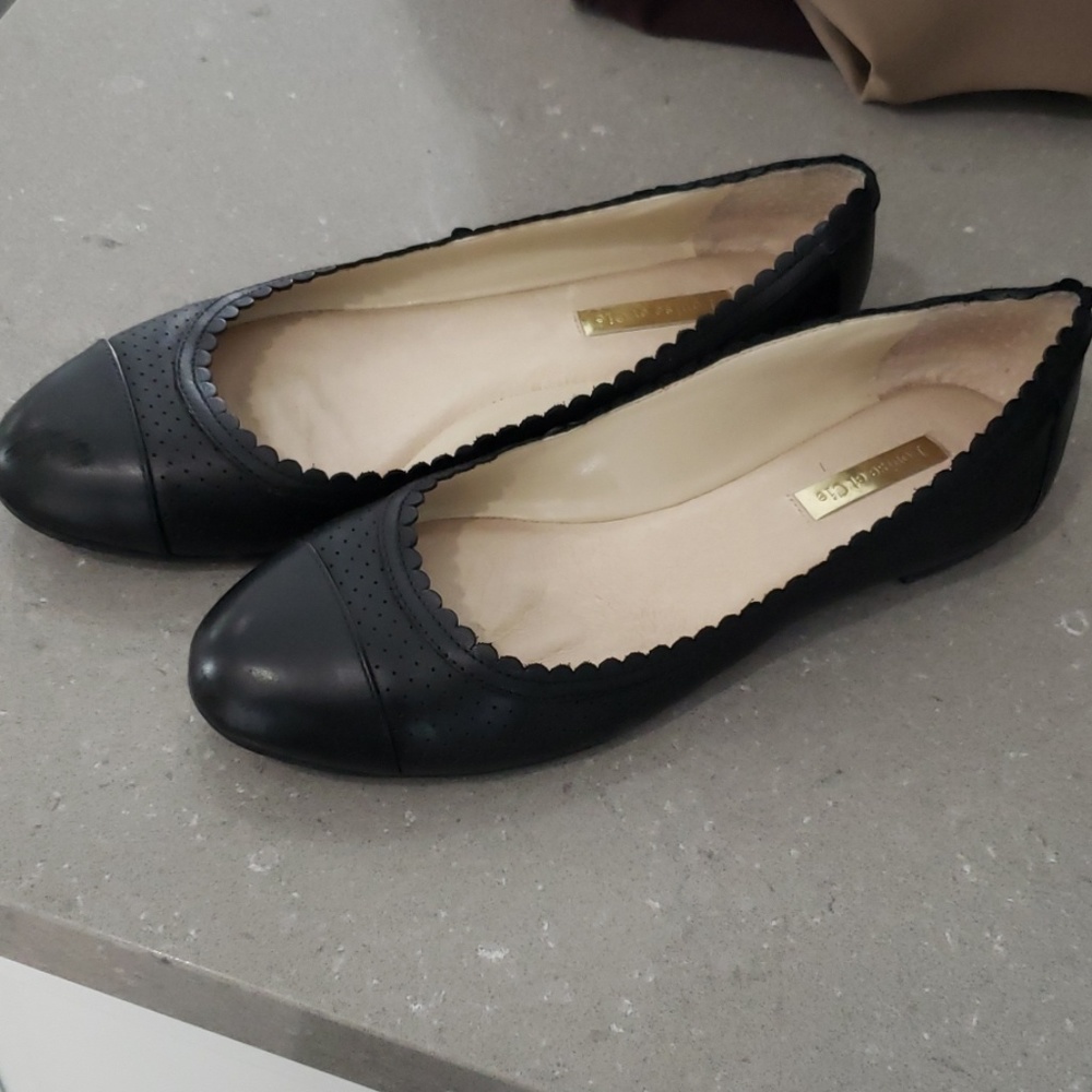 Black leather scalloped flats